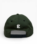 Dark green cap with a white logo on a white background