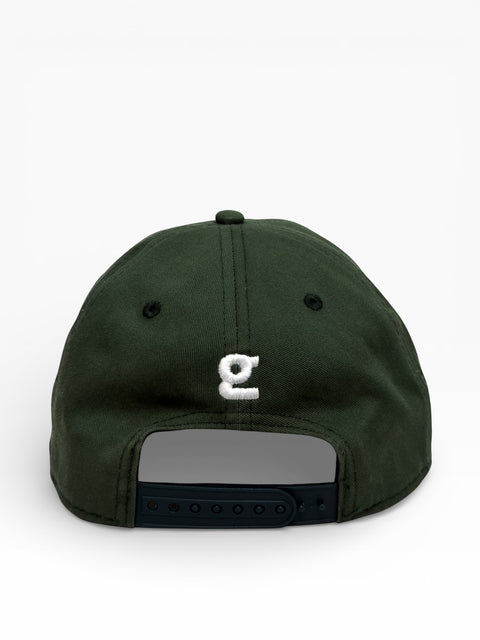 Dark green cap with a white logo on a white background